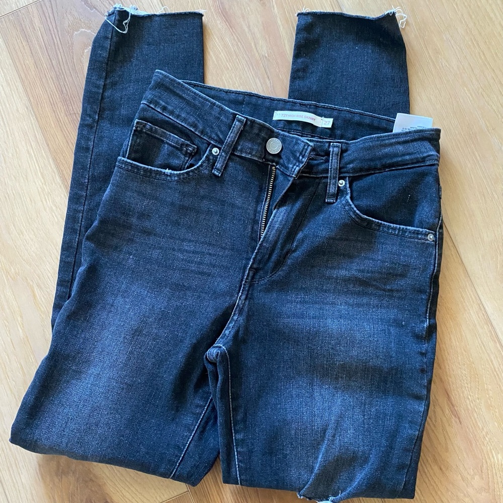 Levi’s 721 high rise skinny distressed black denim